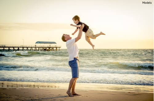 Young-happy-father-holding-up-his-little-son-after-a-daddy-do-over-img-blog